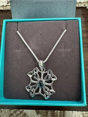 Silver Celtic Flower Pendant Necklace with blue topaz.